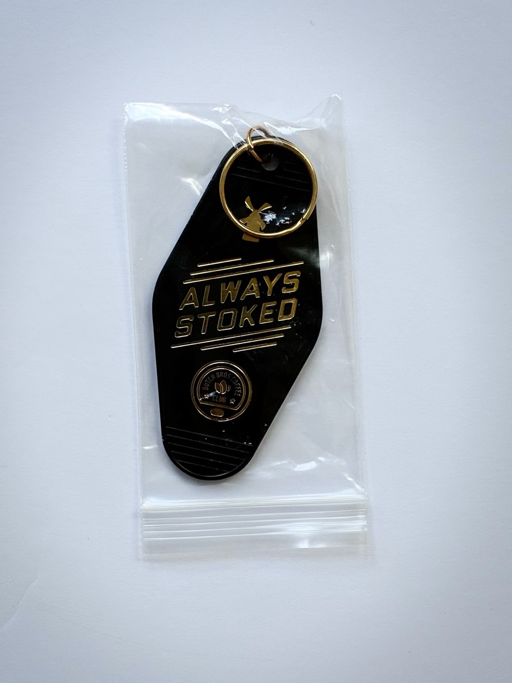 Dutch Bros “Always Stoked” Black & Gold Keychain: UNOPENED